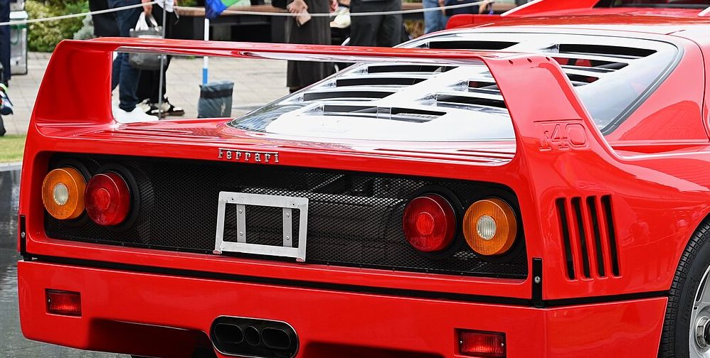 Close-up of the Ferrari F40’s round tail lights, rear wing and slatted bodywork